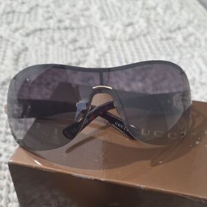 Gucci Black and Gold Sunglasses